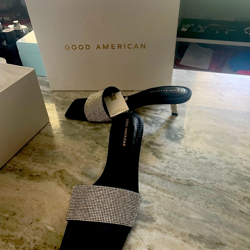 Good American slides, studded and studded heel. Never worn outdoors!